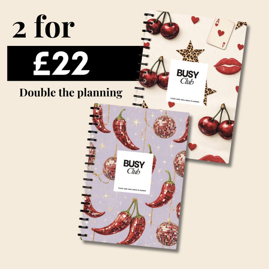 Two spiral-bound planners with colourful designs on a beige background, featuring the brand 'BUSY Club'.