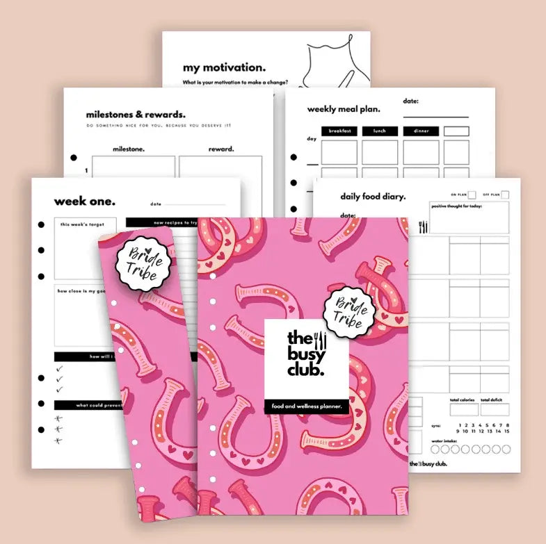Pink planner with 'the busy club' branding and various planning pages on a beige background