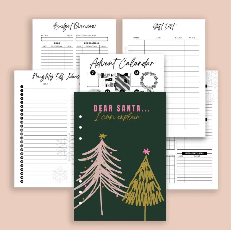 Collection of holiday-themed planners and organizers on a beige background