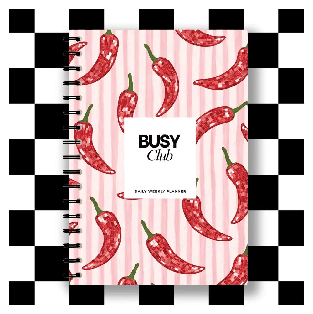 Planner with red chili pepper design on a pink background, featuring the brand 'BUSY Club'.
