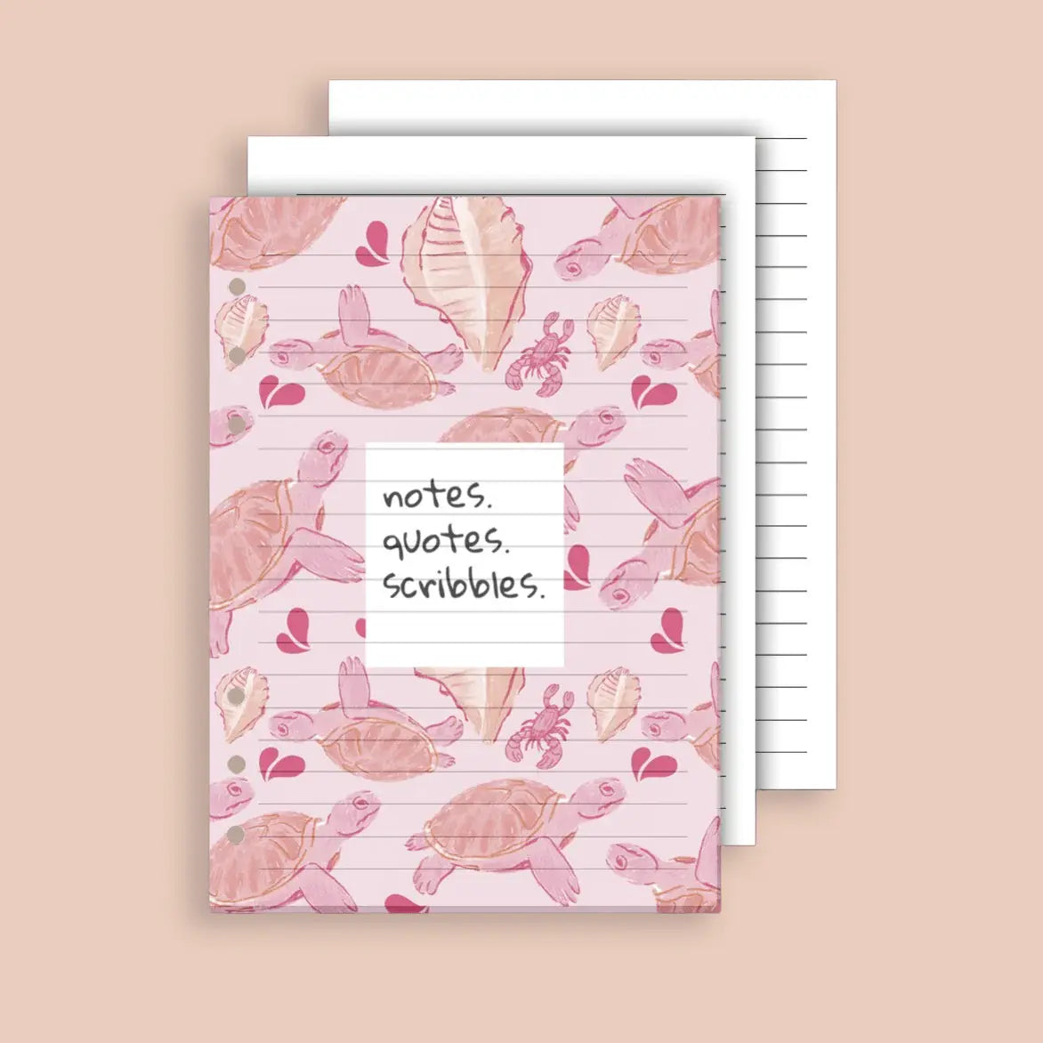 Notebook with turtle pattern and lined pages on a beige background